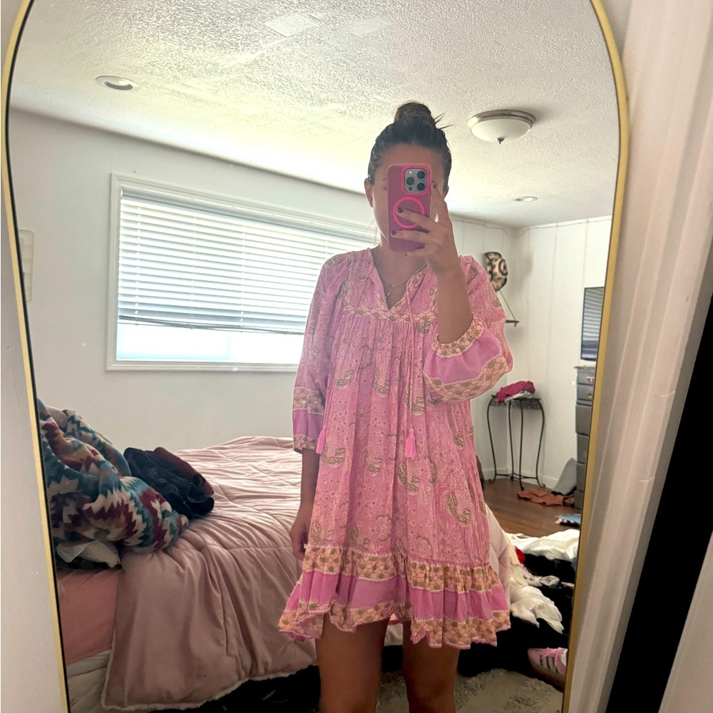 Pink, patterned, flowy and loose Cleobella dress.